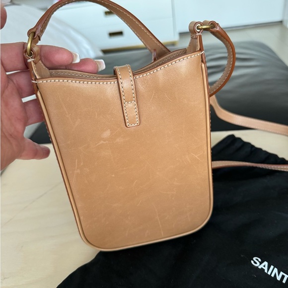 SAINT LAURENT
Smooth Calfskin Le 5 A 7 Vertical
Hobo 
crossbody Tan / Gold - Picture 7 of 16
